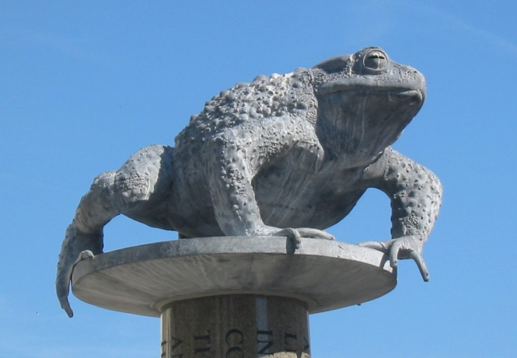 Statue of a crapaud (toad) in St. Helier, Jersey, symbolizing the island's nickname for its residents.
