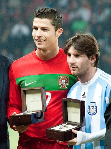 Photo of Lionel Messi and Cristiano Ronaldo standing side by side during the Portugal vs. Argentina match on February 9, 2011. Both benefitted from the tax incentives in Spain.
