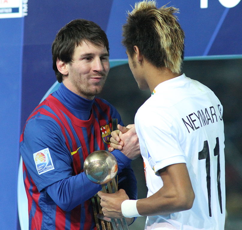 Photo of Lionel Messi and Neymar Jr. shaking hands. Both benefitted from the tax incentives in Spain.