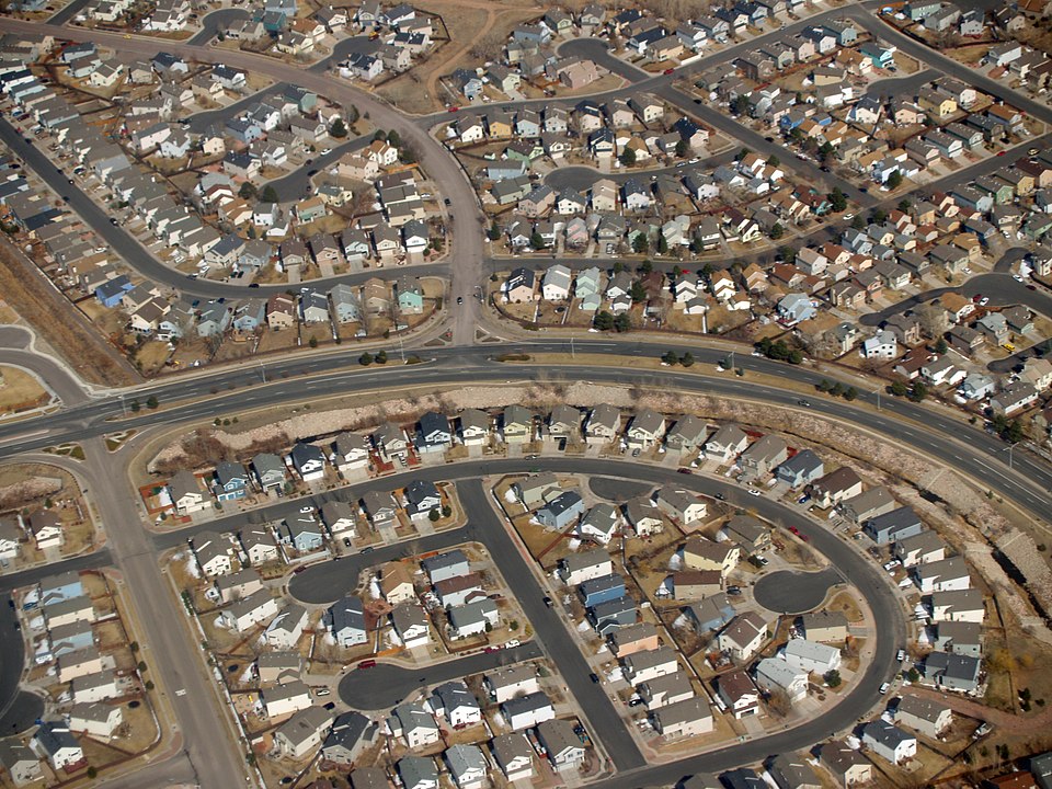 Aerial view of a typical American suburban neighborhood with single-family homes.