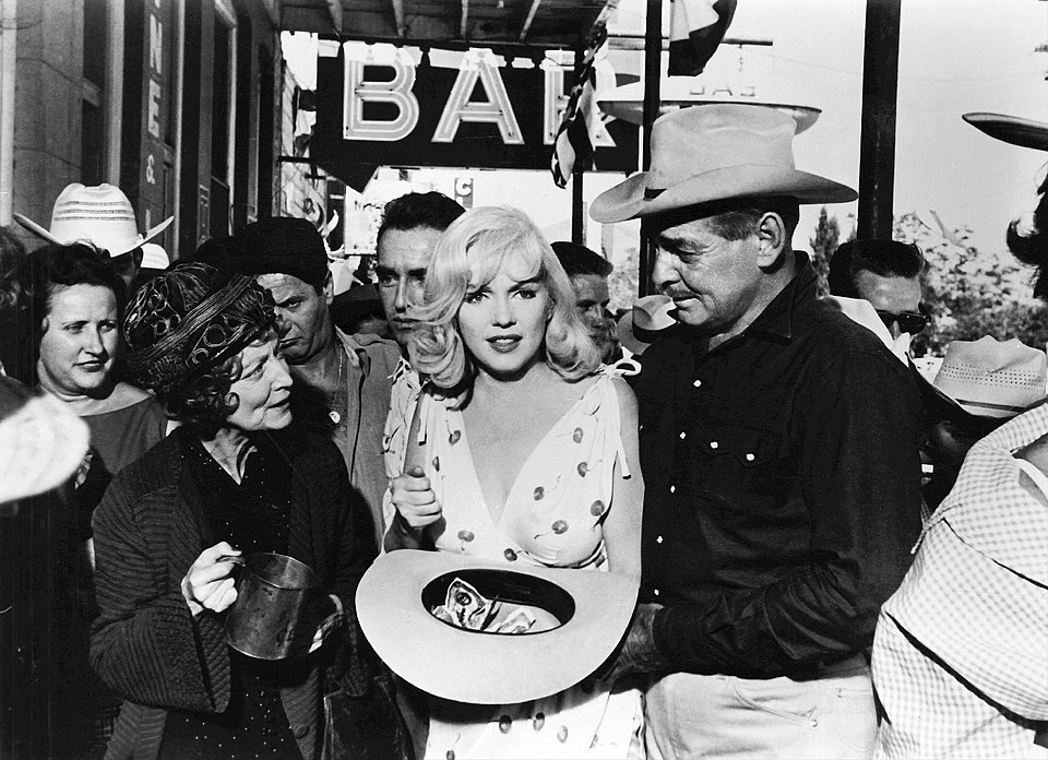 Marilyn Monroe stars in The Misfits (1961). She died a year later leaving her acting coach and therapist as successors.