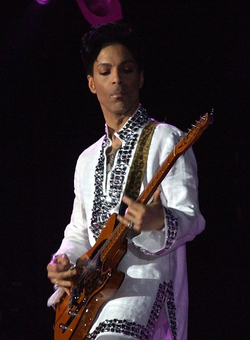 Prince performing live at Coachella, before dying without a will.