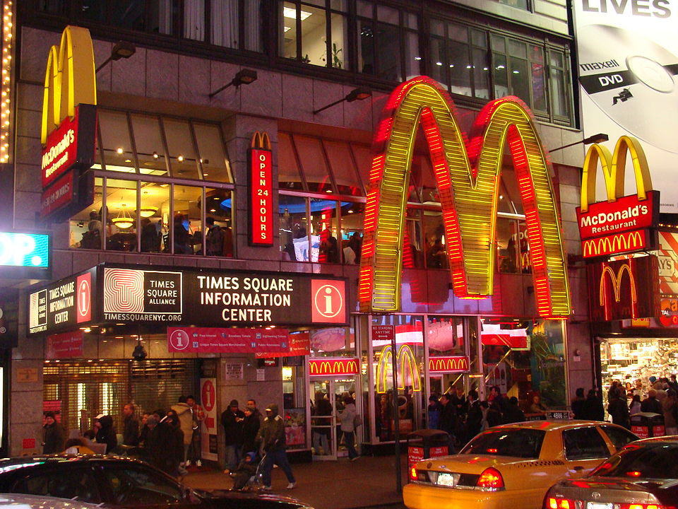 Picture of McDonald’s restaurant in Times Square. Symbol of global scale and centralization as this system manages to survive despite its incredible scale.